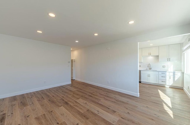 interior space featuring light hardwood / wood-style flooring and sink