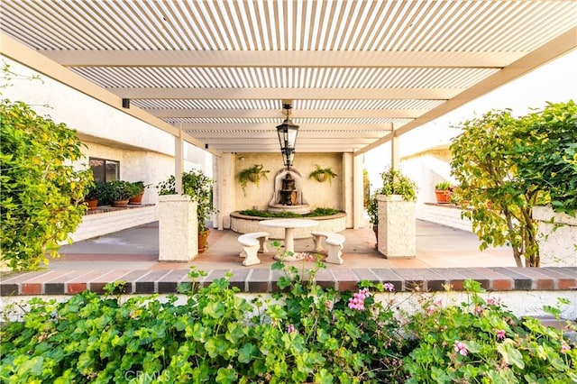 view of patio featuring a pergola