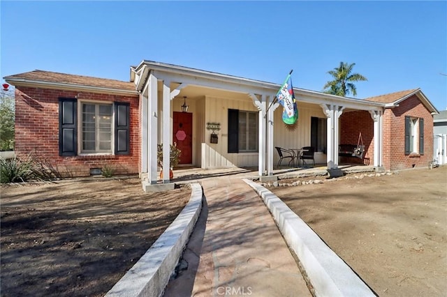 view of front of home featuring covered porch