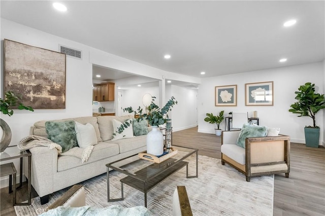 living room featuring light wood-type flooring