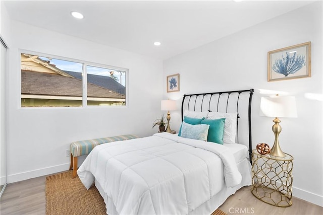 bedroom featuring light hardwood / wood-style flooring