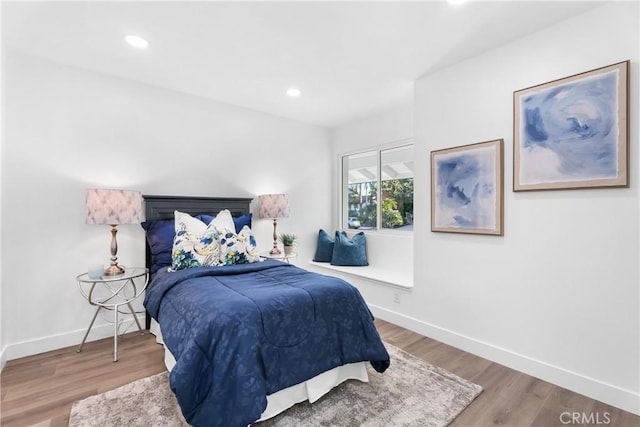 bedroom featuring hardwood / wood-style floors