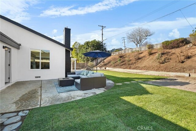 view of yard with a patio area and outdoor lounge area