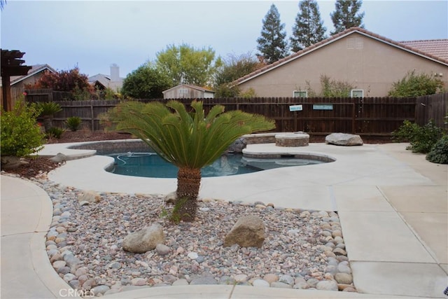 view of pool featuring a patio