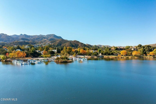 property view of water featuring a mountain view