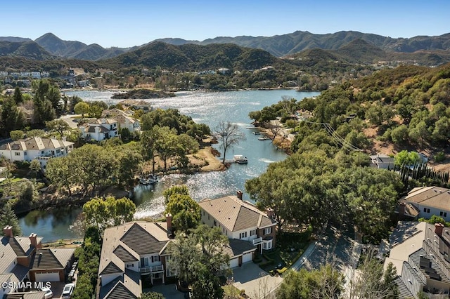 aerial view with a water and mountain view