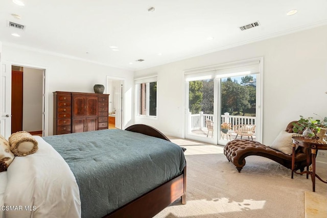 carpeted bedroom featuring ornamental molding and access to outside