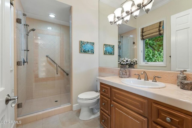 bathroom featuring a shower with shower door, tile patterned floors, vanity, and toilet