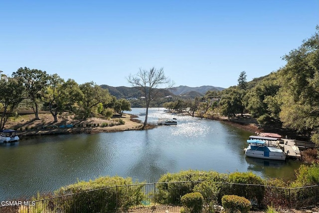 property view of water featuring a mountain view