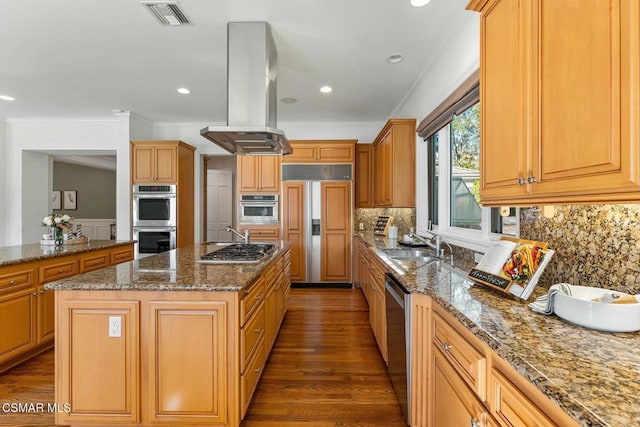 kitchen featuring sink, backsplash, a center island, island range hood, and stainless steel appliances