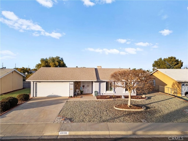 ranch-style house featuring a garage