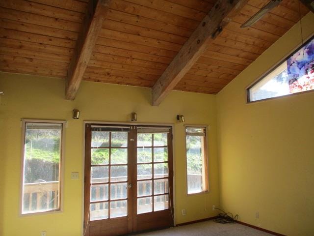 entryway featuring wooden ceiling, carpet flooring, french doors, and lofted ceiling with beams