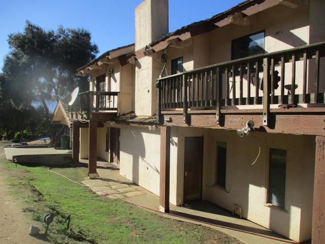 view of property exterior featuring a balcony