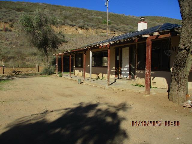 exterior space with a mountain view