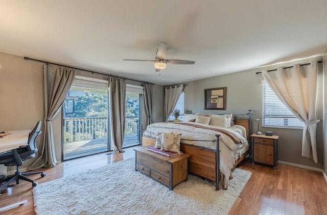 bedroom featuring light wood-type flooring, access to outside, and ceiling fan