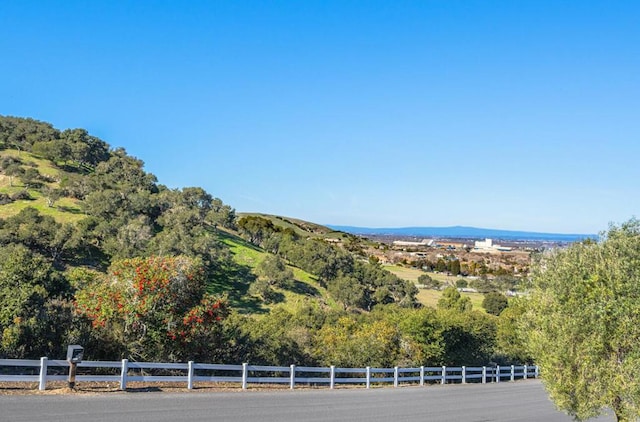 view of mountain feature with a rural view