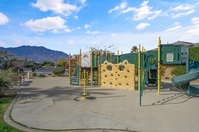 view of play area featuring a mountain view