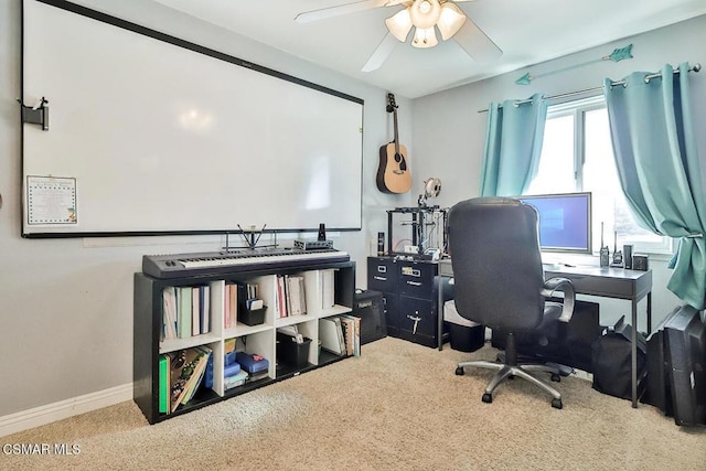 office space with ceiling fan and carpet flooring