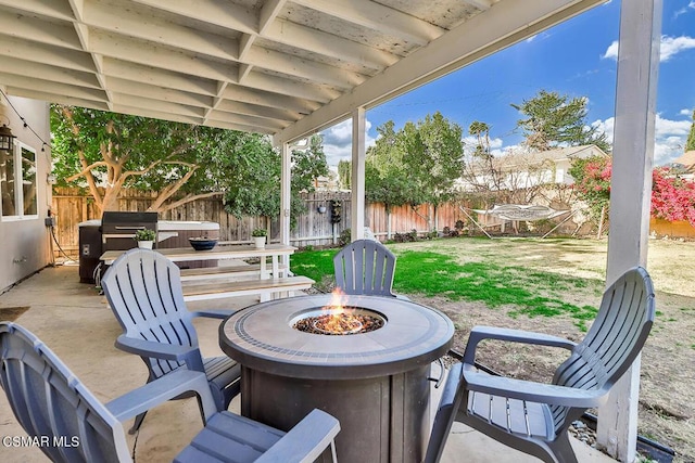 view of patio / terrace featuring a fire pit and area for grilling