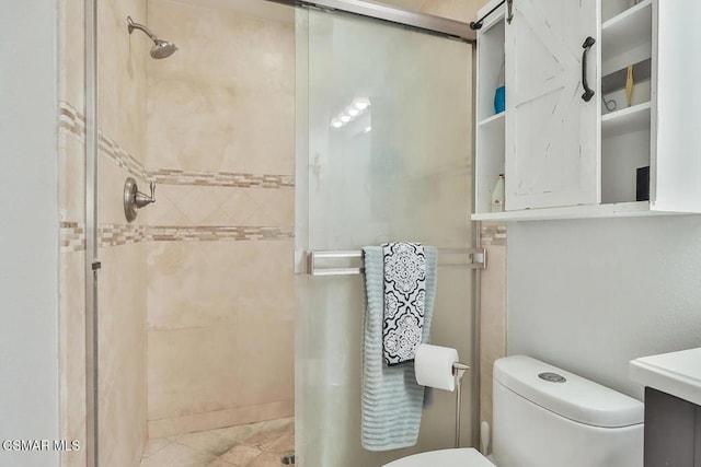 bathroom with an enclosed shower and vanity