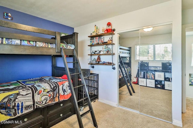 carpeted bedroom featuring a closet