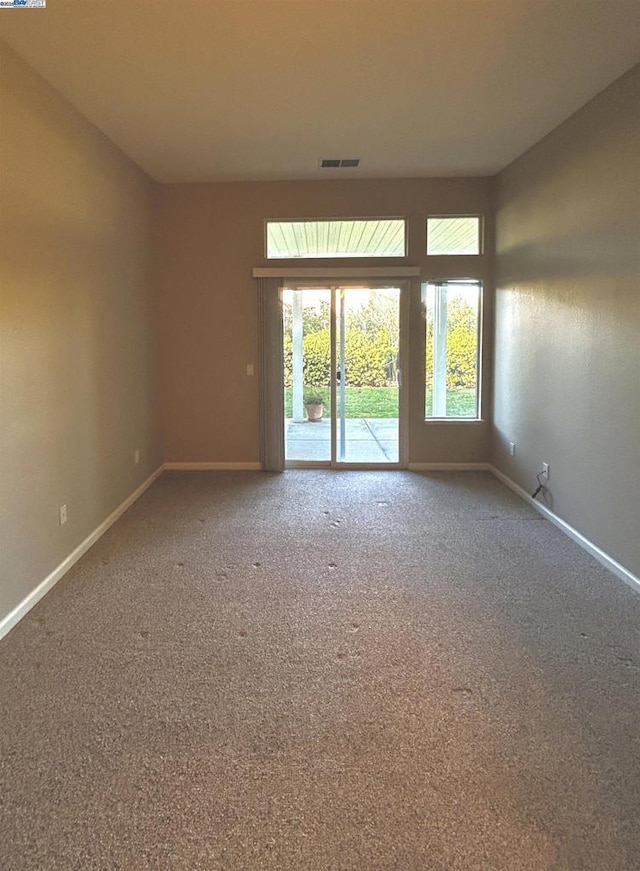 empty room featuring carpet floors