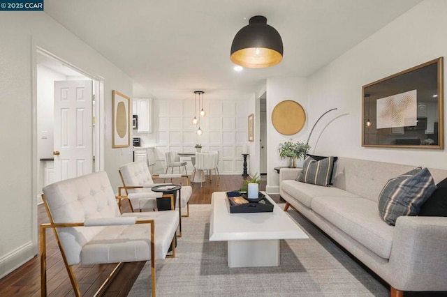 living room featuring dark hardwood / wood-style floors