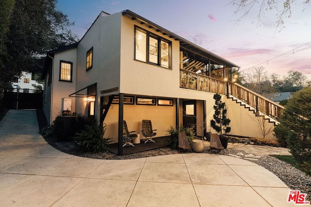 view of front of home featuring a patio area