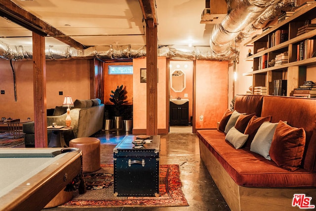 interior space with pool table and sink