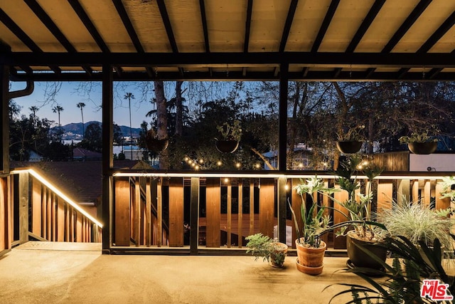 patio terrace at dusk with a mountain view