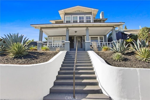 view of front of home featuring covered porch