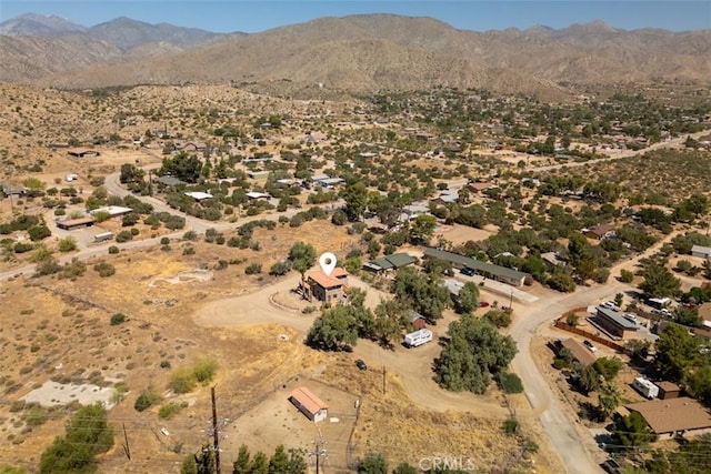 drone / aerial view featuring a mountain view