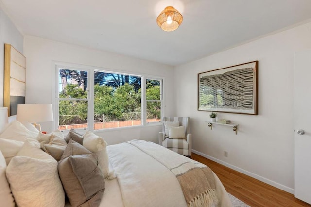 bedroom featuring hardwood / wood-style flooring