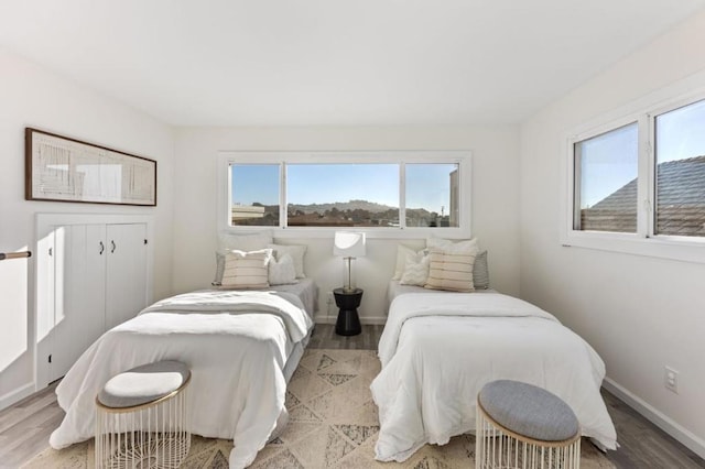 bedroom with light wood-type flooring