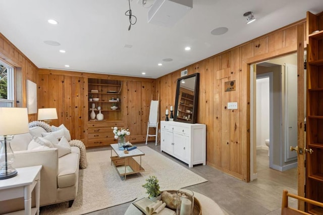 living room with wooden walls