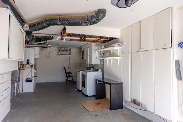 interior space with tankless water heater and independent washer and dryer