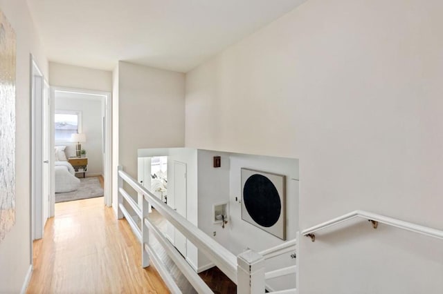 laundry area featuring light hardwood / wood-style flooring