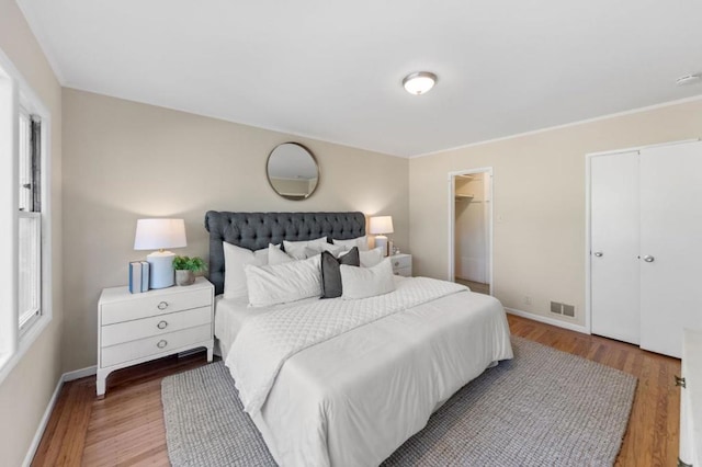 bedroom featuring hardwood / wood-style flooring