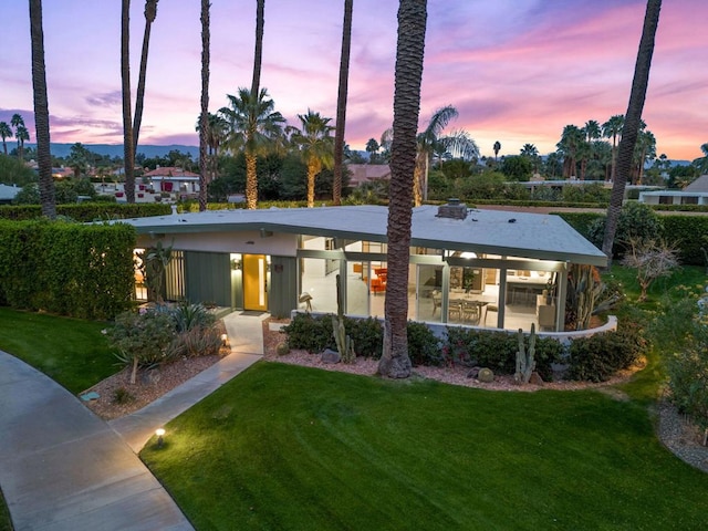 contemporary house featuring a yard