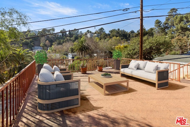 deck featuring an outdoor living space