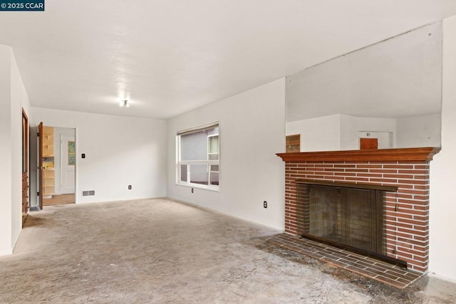 unfurnished living room with a fireplace