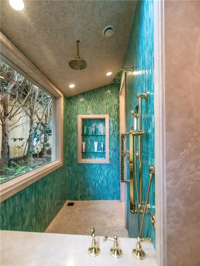 bathroom with vaulted ceiling