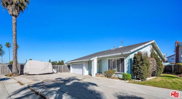 view of front of home with a garage