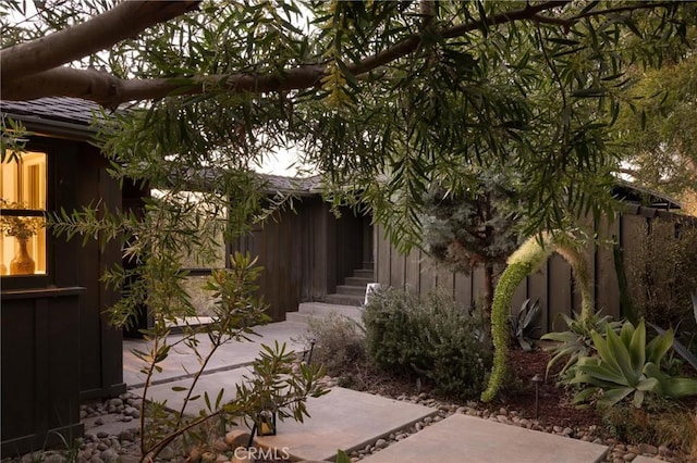 view of patio featuring fence