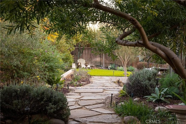 view of yard featuring a patio area and fence