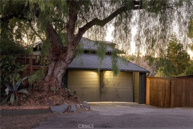 garage featuring fence