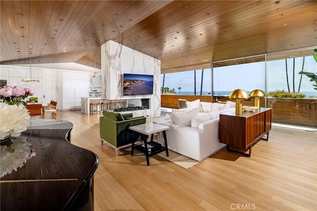 2538 Monaco Dr, Laguna Beach, CA 92651 - living room with wood ceiling, plenty of natural light, vaulted ceiling, wood finished floors, and a chandelier