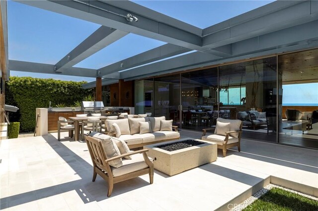 2538 Monaco Dr, Laguna Beach, CA 92651 - view of patio featuring area for grilling, an outdoor living space with a fire pit, and outdoor dining area