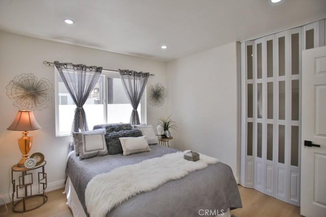 bedroom featuring light wood-type flooring