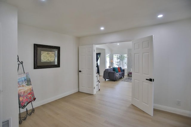 hall featuring light hardwood / wood-style floors